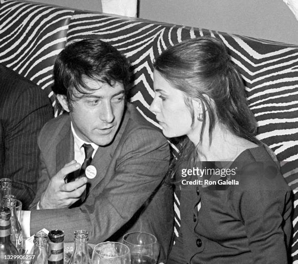 Married actors Dustin Hoffman and Anne Byrne attend a political rally for Eugene McCarthy at Madison Square Garden, New York, New York, May 19, 1968.