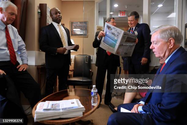 Sen. Ron Johnson , Sen. Tim Scott , Sen. John Barrasso , Sen. Steve Daines and Sen. Lindsey Graham prepare for a news conference at the U.S. Captiol...