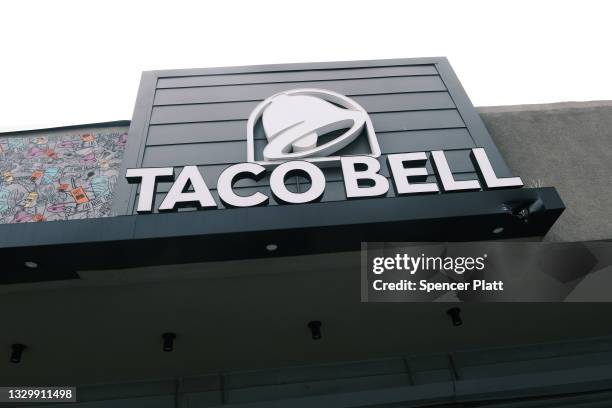 Taco Bell restaurant stands along a Queens street on July 21, 2021 in New York City. The popular fast food chain is facing shortages of some key...