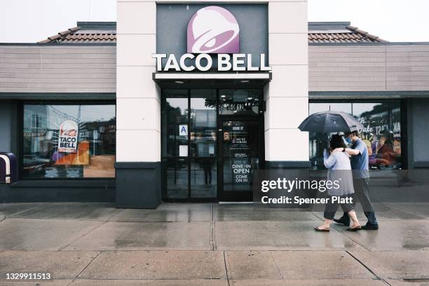 Taco Bell restaurant stands along a Queens street on July 21, 2021 in New York City. The popular fast food chain is facing shortages of some key...