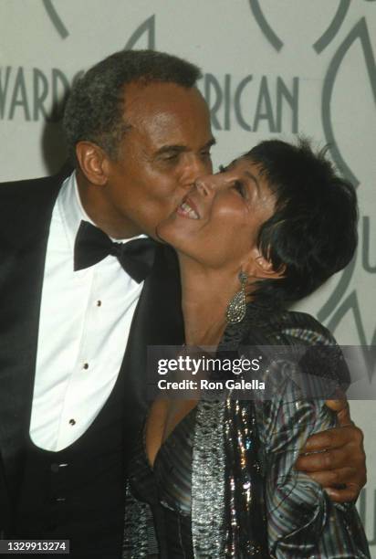 Harry Belafonte and Julie Belafonte attend 13th Annual American Music Awards at the Shrine Auditorium in Los Angeles, California on January 27, 1986.