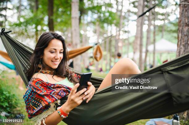 connect with nature, connect with friends. - hammock phone stock pictures, royalty-free photos & images