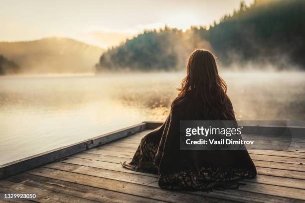 woman relaxing in the nature - spirituality stockfoto's en -beelden