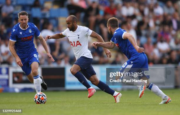 Lucas Moura of Tottenham Hotspur gets away from Alan Judge of Colchester United during the Pre-Season Friendly match between Colchester United and...