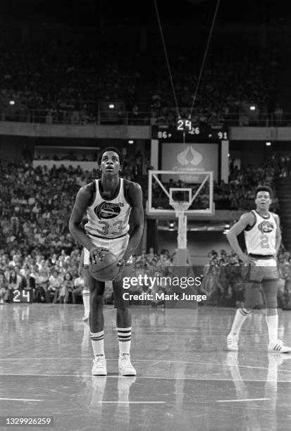 Denver Nuggets forward David Thompson readies himself at the free throw line during an NBA basketball game against the San Antonio Spurs at McNichols...