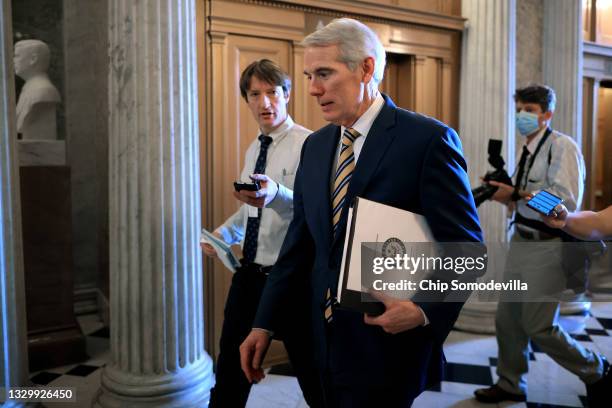 Sen. Rob Portman walks into the Senate Chamber before a vote at the U.S. Capitol on July 21, 2021 in Washington, DC. Senate Majority Leader Charles...