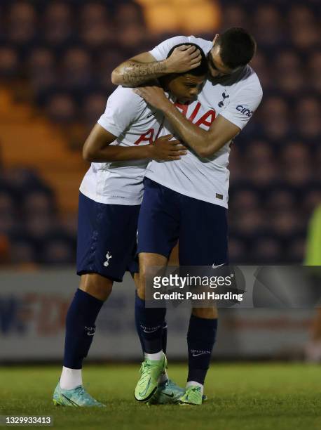 Dane Scarlett interacts with Troy Parrott of Tottenham Hotspur after the Pre-Season Friendly match between Colchester United and Tottenham Hotspur at...