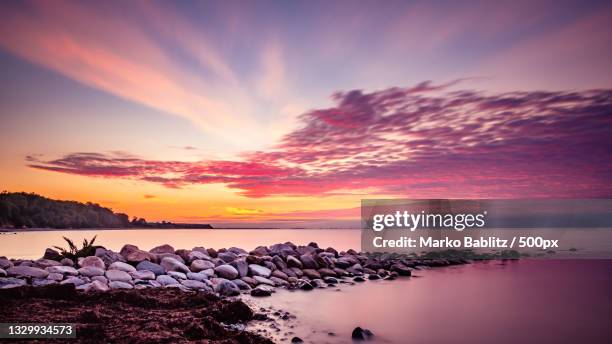 scenic view of sea against sky during sunset,kiel,germany - kiel stock pictures, royalty-free photos & images