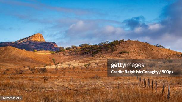 scenic view of field against sky,flinders ranges,south australia,australia - country town australia stock pictures, royalty-free photos & images