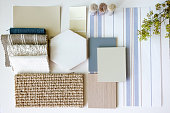 Mood board, sample board, and furniture board concept with samples for interior design arranged in a scheme