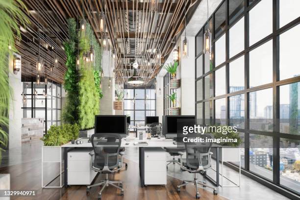 sustainable green co-working office space - office stock pictures, royalty-free photos & images