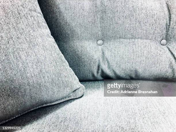 grey sofa - cushion stock pictures, royalty-free photos & images