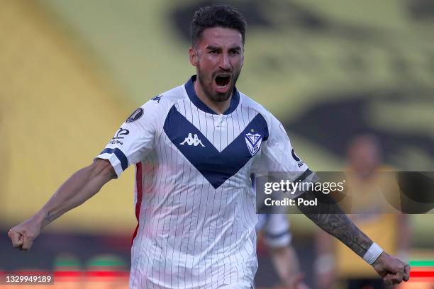 Juan Lucero of Velez celebrates after scoring the first goal of his team during a round of sixteen second leg match between Barcelona SC and Velez as...