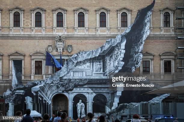 General view during the show of the art installation "Punto di Fuga" by JR on Palazzo Farnese on July 21, 2021 in Rome, Italy. The French street...