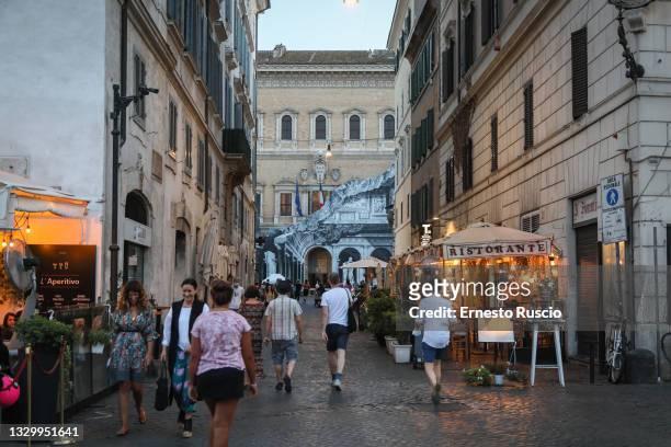 General view during the show of the art installation "Punto di Fuga" by JR on Palazzo Farnese on July 21, 2021 in Rome, Italy. The French street...