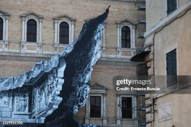 General view during the show of the art installation "Punto di Fuga" by JR on Palazzo Farnese on July 21, 2021 in Rome, Italy. The French street...