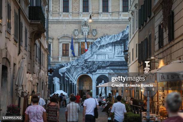 General view during the show of the art installation "Punto di Fuga" by JR on Palazzo Farnese on July 21, 2021 in Rome, Italy. The French street...