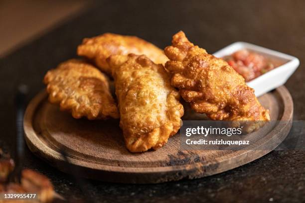 argentine empanadas - empanadas argentina stock pictures, royalty-free photos & images