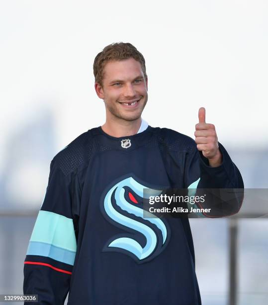 Jamie Oleksiak is selected by the Seattle Kraken during the 2021 NHL Expansion Draft at Gas Works Park on July 21, 2021 in Seattle, Washington. The...