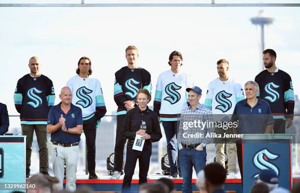 Mark Giordano, Chris Tanev, Jamie Oleksiak, Haydn Fleury, Jordan Eberle and Chris Drieger are introduced as members of the Seattle Kraken during the...