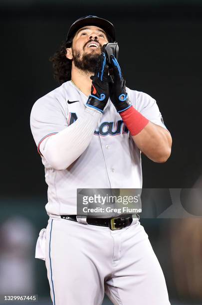 Jorge Alfaro of the Miami Marlins celebrates after driving in the game winning run with a double in the tenth inning against the Washington Nationals...
