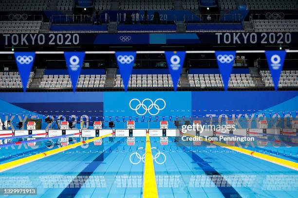 General view of the empty pool during aquatics training at the Tokyo Aquatics Centre ahead of the Tokyo 2020 Olympic Games on July 22, 2021 in Tokyo,...