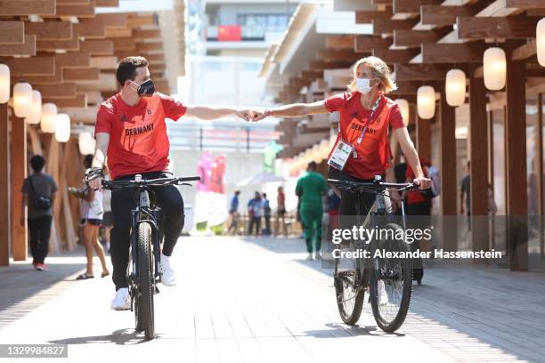 Laura Ludwig and Patrick Hausding of Team Germany arrives at the Olympic Village after have been announced as flag bearers for team Germany for the...