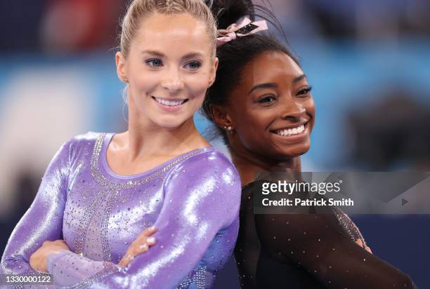 Mykayla Skinner and Simone Biles of Team United States pose for a photo during Women's Podium Training ahead of the Tokyo 2020 Olympic Games at...