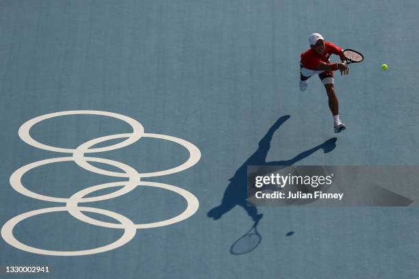 Kei Nishikori of Team Japan plays a forehand during the practice session ahead of the Tokyo 2020 Olympic Games at Ariake Tennis Park on July 22, 2021...