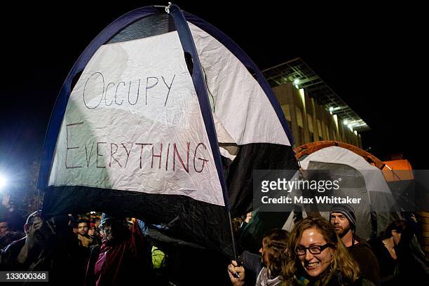 University of California, Berkeley students set up tents after a general assembly voted to again occupy campus as part of an "open university" strike...