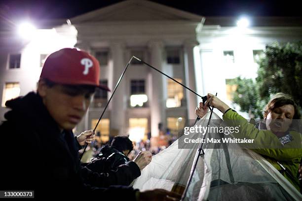 University of California, Berkeley students set up tents after a general assembly voted to again occupy campus as part of an "open university" strike...