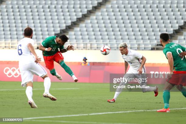 Alexis Vega of Team Mexico scores their side's first goal during the Men's First Round Group A match between Mexico and France during the Tokyo 2020...