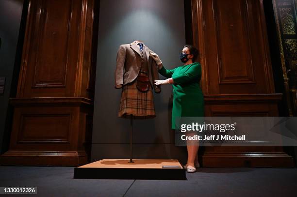 Sally Goodsir, views the 1952 Balmoral Tartan Kilt during HRH The Prince Philip, Duke of Edinburgh Commemorations at The Palace Of Holyroodhouse on...