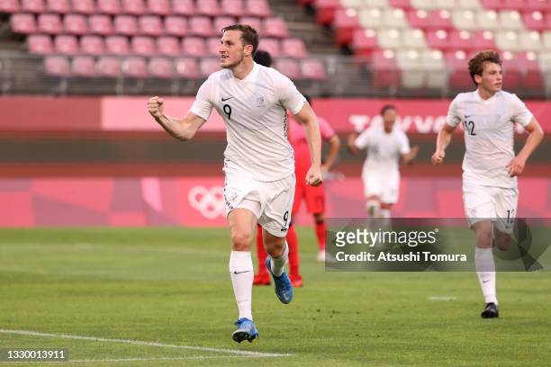 Chris Wood of Team New Zealand celebrates after scoring their side's first goal during the Men's First Round Group B match between New Zealand and...