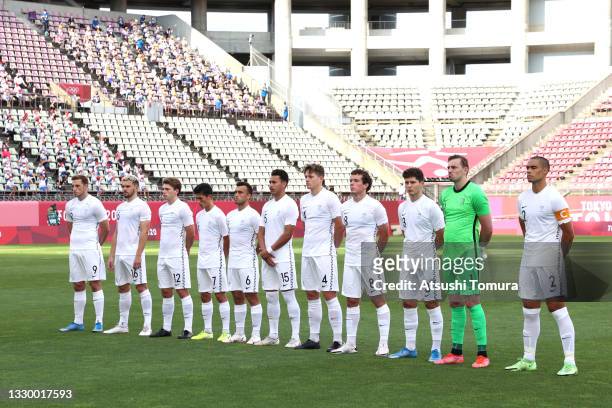 Players of Team New Zealand stand for the national anthem prior to the Men's First Round Group B match between New Zealand and Republic of Korea...