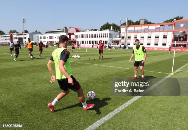 Players of FC Bayern Muenchen practice during a training session at the club's Saebener Strasse training ground on July 22, 2021 in Munich, Germany.