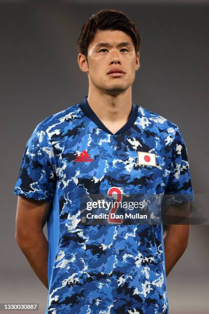 Hiroki Sakai of Team Japan stands for the national anthem prior to the Men's First Round Group A match between Japan and South Africa during the...