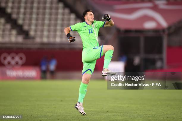 Marian Aioani of Team Romania celebrates their side's first goal, an own goal by Elvin Oliva of Team Honduras during the Men's First Round Group B...