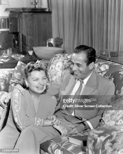 American actor Humphrey Bogart with his third wife, actress Mayo Methot .