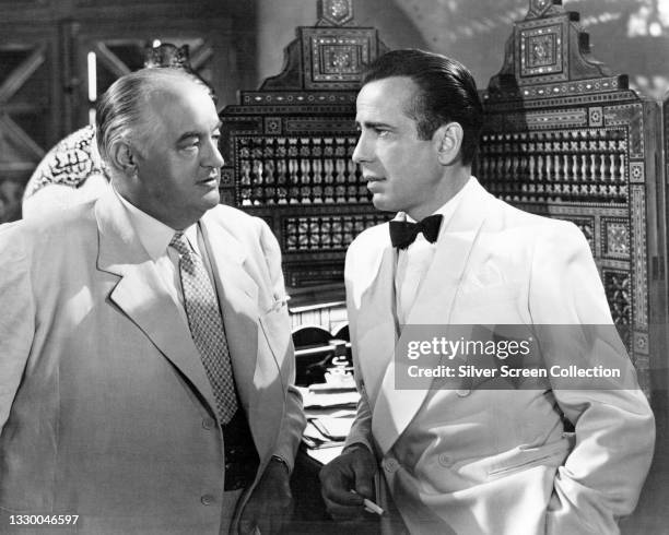 Actors Humphrey Bogart as 'Rick Blaine' and Sydney Greenstreet as 'Signor Ferrari' in film 'Casablanca', 1942.