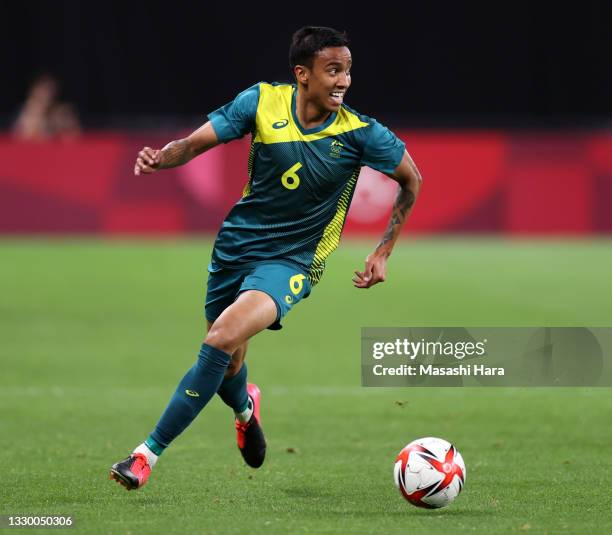 Keanu Baccus of Team Australia in action during the Men's First Round Group C match between Argentina and Australia during the Tokyo 2020 Olympic...