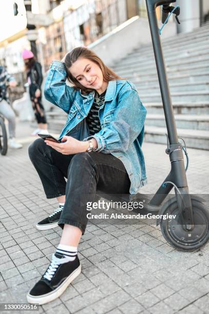 modern beautiful female taking electric scooter selfie with friends - mobility scooter stock pictures, royalty-free photos & images