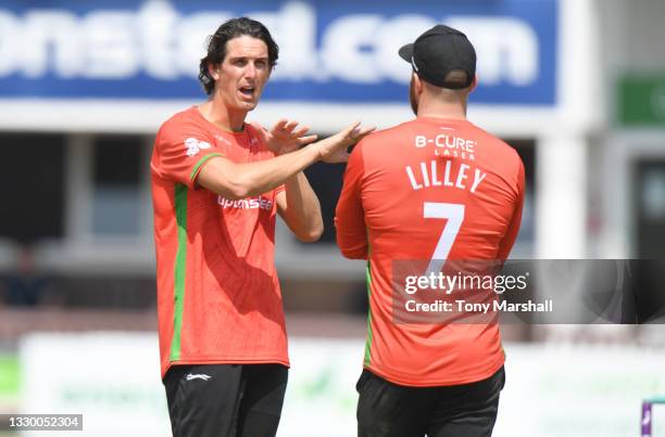 Chris Wright and Arron Lilley of Leicestershire discuss the bowling during the Royal London Cup match between Leicestershire and Derbyshire at...