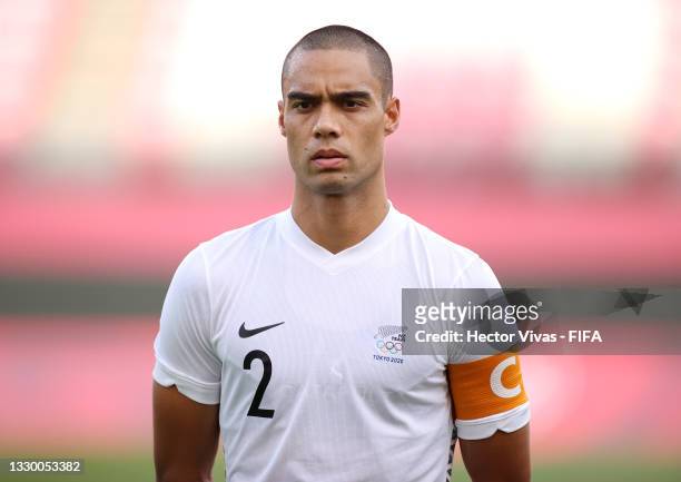 Winston Reid of Team New Zealand stands for the national anthem prior to the Men's First Round Group B match between New Zealand and Republic of...
