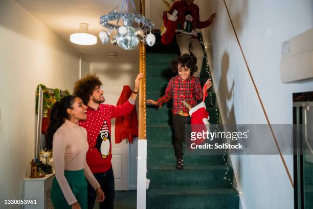 santa's been! - child running up stairs stock pictures, royalty-free photos & images