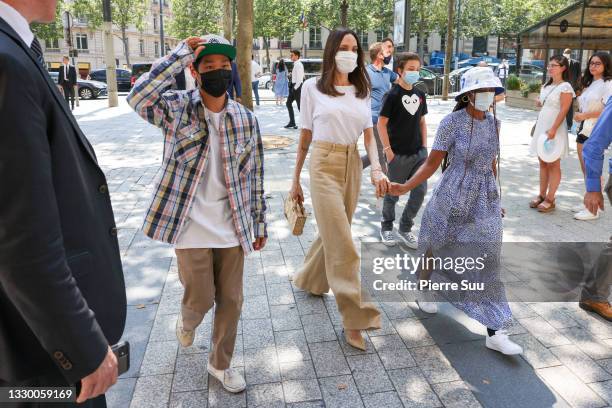 Angelina Jolie, Pax Thien Jolie, Zahara-Marley Jolie and Knox-Leon Jolie are seen arriving at the "Guerlain" store on the champs Elysees on July 22,...