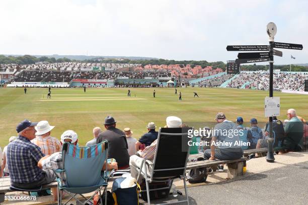 General view as spectators watch the action during the Royal London Cup match between Yorkshire and Surrey at North Marine Road Ground on July 22,...