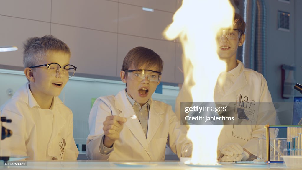 Boy Body Experiments Excited Boys Conducting Scientific Experiment With Fire Laboratory ...
