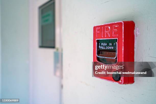 break glass in case of fire - workplace evacuation stock pictures, royalty-free photos & images