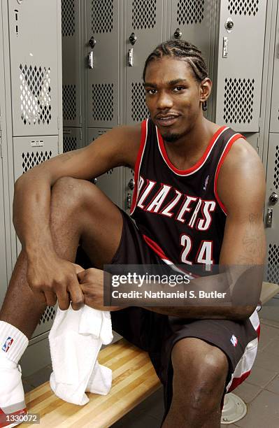 Qyntel Woods of the Portland Trail Blazers poses for a portrait during the rookie photo shoot on August 4, 2002 at St. Peter's Prep in Jersey City,...